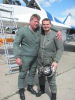 June, 2012. Pilot with a tourist after the flight in MiG-29