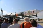 Tourists looking verticalization of Soyuz