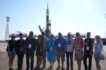 Tourists on Launchpad on verticalization of Soyuz spaceship.Baikonur.