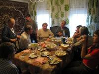 Family dinner in Russian village